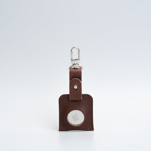 Accesorio de cuero para bolso AirTag con mosquetón